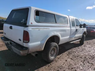 2002 Ford F-250 XL с VIN 1FTNX21F12EA84786, выставлен на аукционе Copart как лот 54698515 с пробегом 290 820 миль миль и Списание • Salvage title. История ставок и продаж доступна на DreamBid. Изображение 3.
