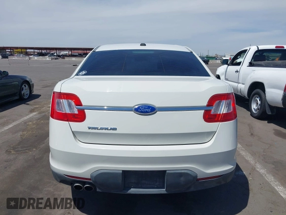 2011 Ford Taurus SE with VIN 1FAHP2DW1BG165371, listed as a IAAI auction lot 42164608 with 186,485 mi miles. Bid and sale history available at carsss.com. Image 17.