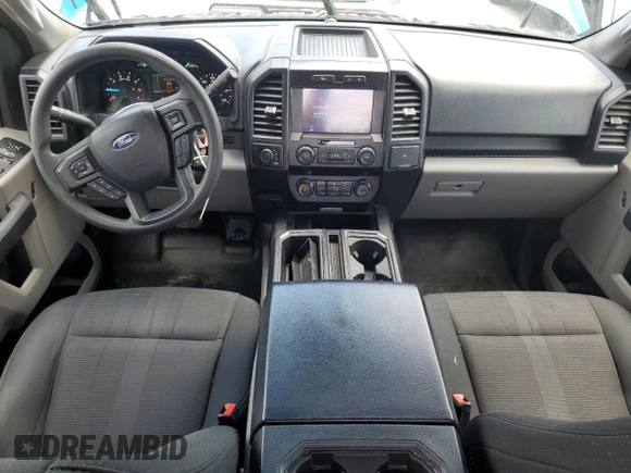 2019 Ford F-150 XL with VIN 1FTEW1EP8KFC61814, listed as a Copart auction lot 57703735 with 105,273 mi miles and Salvage title. Bid and sale history available at DreamBid. Image 8.