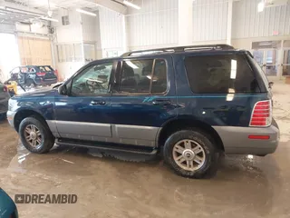 2003 Mercury Mountaineer Convenience z VIN 4M2ZU86W03UJ16828, wystawiony jako IAAI lot #41580919 z przebiegiem 148 968 mil mil oraz . Historia ofert i sprzedaży dostępna na DreamBid. Obrazek 14.