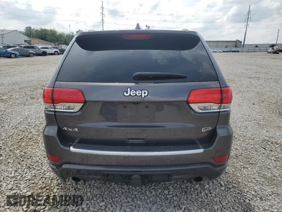 2017 Jeep Grand Cherokee Overland z VIN 1C4RJFCG1HC684826, wystawiony jako Copart lot #59971595 z przebiegiem 101 765 mil mil oraz Szkoda całkowita • Salvage title. Historia ofert i sprzedaży dostępna na DreamBid. Obrazek 6.