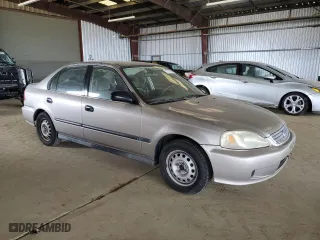 2000 Honda Civic LX with VIN 1HGEJ6671YL054252, listed as a Copart auction lot 53310845 with 215,222 mi miles and Clean Title. Bid and sale history available at carsss.com. Image 4.