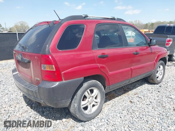 2005 Kia Sportage LX with VIN KNDJF723257132310, listed as a IAAI auction lot 41838054 with Not Provided miles and . Bid and sale history available at carsss.com. Image 4.
