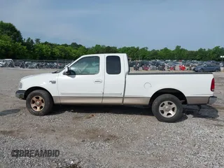 2001 Ford F-150 XL z VIN 1FTRX17WX1NA20036, wystawiony jako IAAI lot #42231600 z przebiegiem 181 549 mil mil oraz . Historia ofert i sprzedaży dostępna na DreamBid. Obrazek 14.