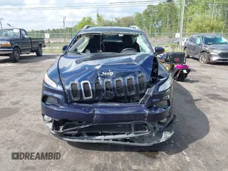 2015 Jeep Cherokee Latitude with VIN 1C4PJLCB5FW694359, listed as a IAAI auction lot 41934213 with 117,723 mi miles and . Bid and sale history available at DreamBid. Image 12.