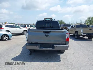 2018 Nissan Titan SV with VIN 1N6AA1E6XJN525640, listed as a IAAI auction lot 42139103 with 88,338 mi miles and . Bid and sale history available at DreamBid. Image 16.