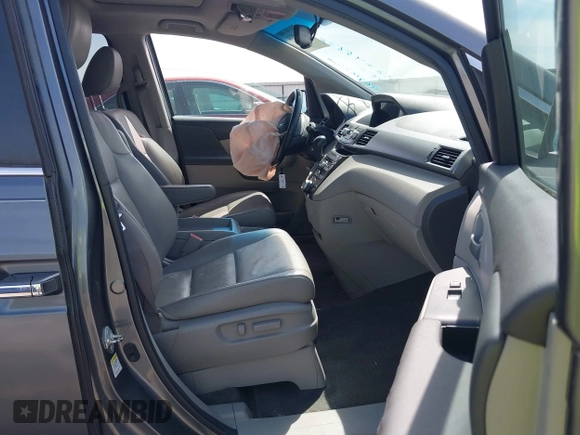 2011 Honda Odyssey EX-L with VIN 5FNRL5H69BB092752, listed as a IAAI auction lot 42245534 with 142,718 mi miles and . Bid and sale history available at DreamBid. Image 5.