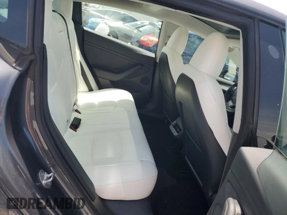 2023 Tesla Model 3 z VIN 5YJ3E1EA0PF571943, wystawiony jako Copart lot #58338235 z przebiegiem 41 584 mil mil oraz Szkoda całkowita • Salvage title. Historia ofert i sprzedaży dostępna na DreamBid. Obrazek 10.