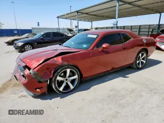 2014 Dodge Challenger R/T with VIN 2C3CDYBT8EH225247, listed as a Copart auction lot 58362085 with 144,776 mi miles and Salvage title. Bid and sale history available at DreamBid. Image 1.