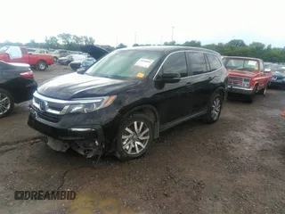2021 Honda Pilot EX-L with VIN 5FNYF5H50MB011165, listed as a IAAI auction lot 39799892 with 95,040 mi miles and . Bid and sale history available at DreamBid. Image 18.