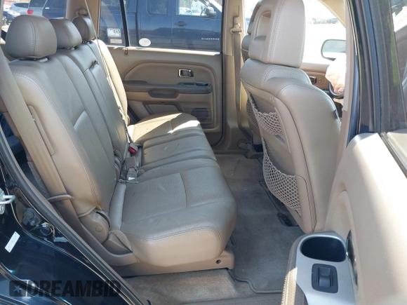 2005 Honda Pilot EX-L with VIN 5FNYF18555B043104, listed as a IAAI auction lot 41888235 with 127,781 mi miles. Bid and sale history available at carsss.com. Image 8.