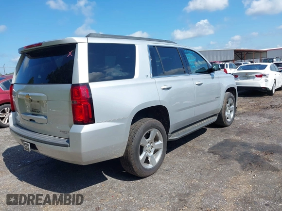 2017 Chevrolet Tahoe LT with VIN 1GNSCBKC6HR400761, listed as a IAAI auction lot 42612368 with 125,843 mi miles and . Bid and sale history available at DreamBid. Image 4.