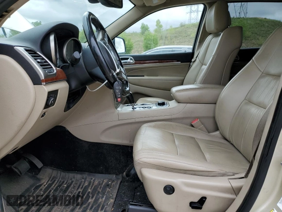 2011 Jeep Grand Cherokee Limited z VIN 1J4RR5GT1BC590599, wystawiony jako Copart lot #58657915 z przebiegiem 103 897 mil mil oraz Czysty tytuł • Clean title. Historia ofert i sprzedaży dostępna na DreamBid. Obrazek 7.
