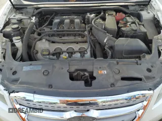 2010 Ford Taurus Limited with VIN 1FAHP2FW4AG144445, listed as a Copart auction lot 56878295 with 148,439 mi miles and Salvage title. Bid and sale history available at DreamBid. Image 11.