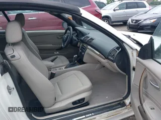 2010 BMW 1 Series 128i with VIN WBAUL7C52AVJ77773, listed as a IAAI auction lot 42146261 with 91,777 mi miles and . Bid and sale history available at carsss.com. Image 5.