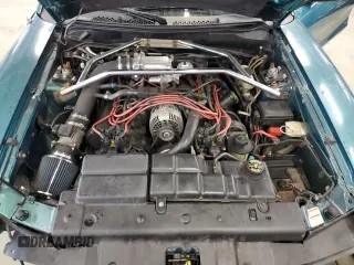 1996 Ford Mustang GT z VIN 1FALP42X5TF191769, wystawiony jako Copart lot #49364525 z przebiegiem 69 029 mil mil oraz Szkoda całkowita • Salvage title. Historia ofert i sprzedaży dostępna na DreamBid. Obrazek 11.
