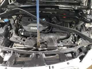 2016 BMW X1 xDrive28i with VIN WBXHT3C3XG5E51117, listed as a Copart auction lot 48243355 with 129,607 mi miles and Salvage Title. Bid and sale history available at carsss.com. Image 11.