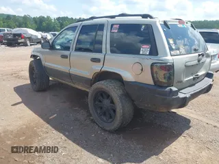 2004 Jeep Grand Cherokee Laredo with VIN 1J4GW48S34C354006, listed as a IAAI auction lot 42599812 with 258,004 mi miles and . Bid and sale history available at DreamBid. Image 3.