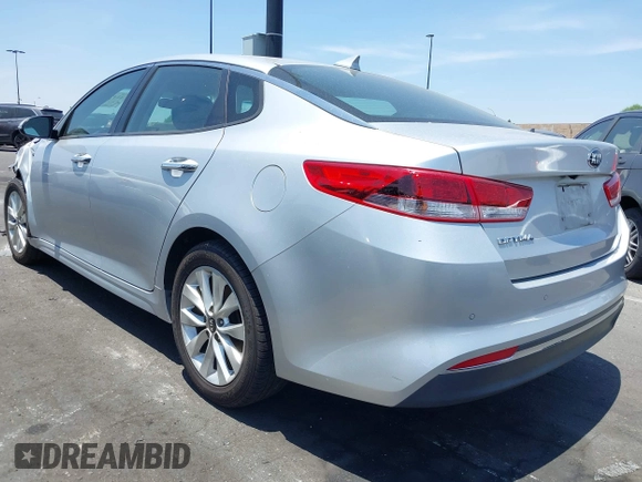 2018 Kia Optima LX with VIN 5XXGT4L35JG266892, listed as a IAAI auction lot 42473938 with 79,690 mi miles and . Bid and sale history available at DreamBid. Image 3.
