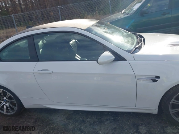 2013 BMW M3 with VIN WBSKG9C57DJ593607, listed as a IAAI auction lot 41586910 with 102,940 mi miles. Bid and sale history available at carsss.com. Image 13.