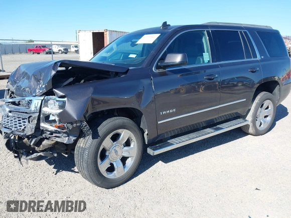 2017 Chevrolet Tahoe LT with VIN 1GNSCBKC1HR403647, listed as a IAAI auction lot 42237667 with 90,969 mi miles and . Bid and sale history available at DreamBid. Image 2.