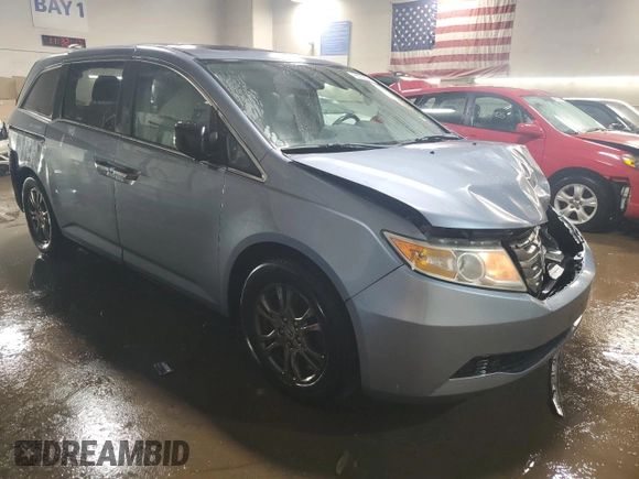 2013 Honda Odyssey EX-L with VIN 5FNRL5H64DB080141, listed as a Copart auction lot 49553235 with 128,358 mi miles and Salvage Title. Bid and sale history available at carsss.com. Image 4.