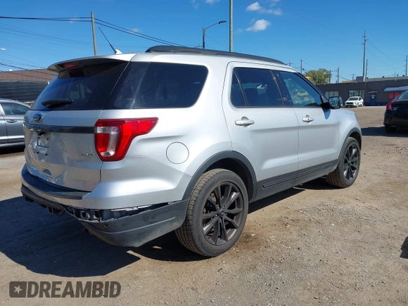 2018 Ford Explorer XLT with VIN 1FM5K8D85JGC40261, listed as a IAAI auction lot 40551477 with 70,177 mi miles and . Bid and sale history available at DreamBid. Image 4.