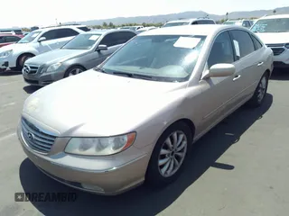 2006 Hyundai Azera SE z VIN KMHFC46F06A121839, wystawiony jako IAAI lot #37194434 z przebiegiem 169 698 mil mil oraz . Historia ofert i sprzedaży dostępna na DreamBid. Obrazek 2.