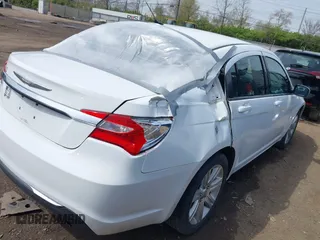 2011 Chrysler 200 Touring with VIN 1C3BC1FB4BN614249, listed as a IAAI auction lot 42041630 with 197,101 mi miles. Bid and sale history available at carsss.com. Image 4.