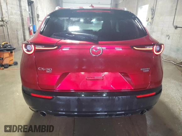 2021 Mazda CX-30 Premium Plus z VIN 3MVDMBEY9MM262293, wystawiony jako Copart lot #61369265 z przebiegiem 52 570 mil mil oraz Szkoda całkowita • Salvage title. Historia ofert i sprzedaży dostępna na DreamBid. Obrazek 6.