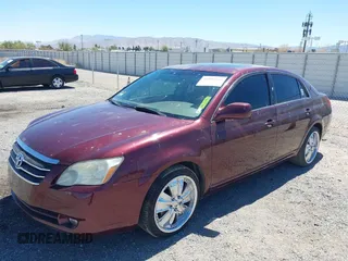 2006 Toyota Avalon XL with VIN 4T1BK36B36U087385, listed as a IAAI auction lot 41986866 with 128,594 mi miles. Bid and sale history available at carsss.com. Image 2.