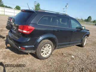 2017 Dodge Journey SXT with VIN 3C4PDDBG8HT525147, listed as a Copart auction lot 63270795 with 169,369 mi miles and Salvage title. Bid and sale history available at DreamBid. Image 3.