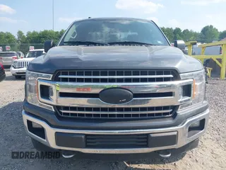 2018 Ford F-150 XL with VIN 1FTFX1E58JFD92806, listed as a IAAI auction lot 42424589 with 144,476 mi miles and . Bid and sale history available at DreamBid. Image 12.