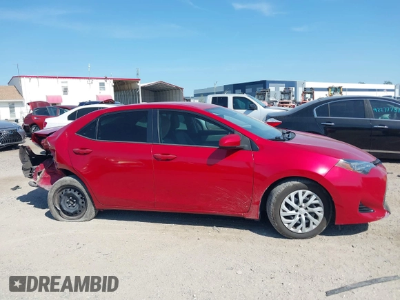 2018 Toyota Corolla L z VIN 2T1BURHE1JC011808, wystawiony jako IAAI lot #42289116 z przebiegiem 124 379 mil mil oraz . Historia ofert i sprzedaży dostępna na DreamBid. Obrazek 13.