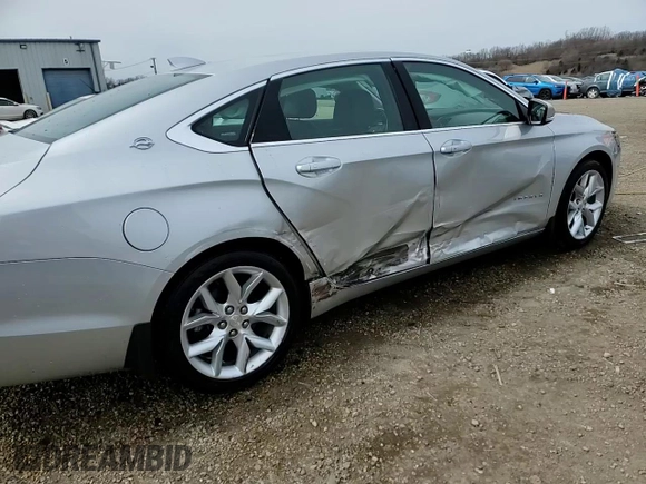 2017 Chevrolet Impala LT with VIN 2G1105S35H9144744, listed as a Copart auction lot 51309035 with 52,728 mi miles and Salvage Title. Bid and sale history available at DreamBid. Image 13.