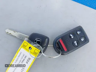 2007 Honda Odyssey EX-L with VIN 5FNRL38677B021464, listed as a IAAI auction lot 41568582 with 131,359 mi miles and . Bid and sale history available at DreamBid. Image 11.