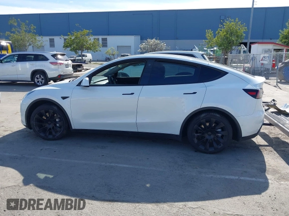 2022 Tesla Model Y Long Range with VIN 7SAYGDEE0NF340822, listed as a IAAI auction lot 41881224 with Not Provided miles and . Bid and sale history available at DreamBid. Image 15.