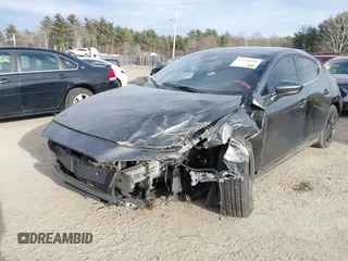 2021 Mazda 3 Premium with VIN JM1BPAML2M1310374, listed as a IAAI auction lot 41190608 with 97,648 mi miles. Bid and sale history available at carsss.com. Image 6.