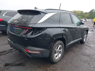 2022 Hyundai Tucson SEL z VIN 5NMJBCAE9NH015906, wystawiony jako IAAI lot #42169136 z przebiegiem 28 009 mil mil oraz . Historia ofert i sprzedaży dostępna na DreamBid. Obrazek 4.