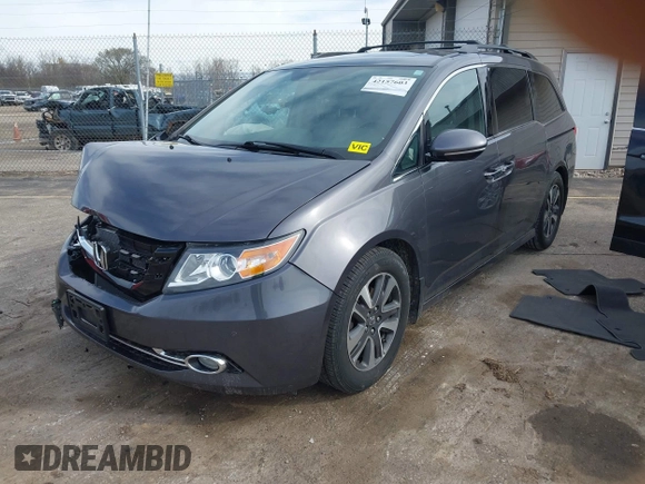 2016 Honda Odyssey Touring Elite z VIN 5FNRL5H99GB072860, wystawiony jako IAAI lot #42157603 z przebiegiem 221 449 mil mil oraz . Historia ofert i sprzedaży dostępna na DreamBid. Obrazek 2.