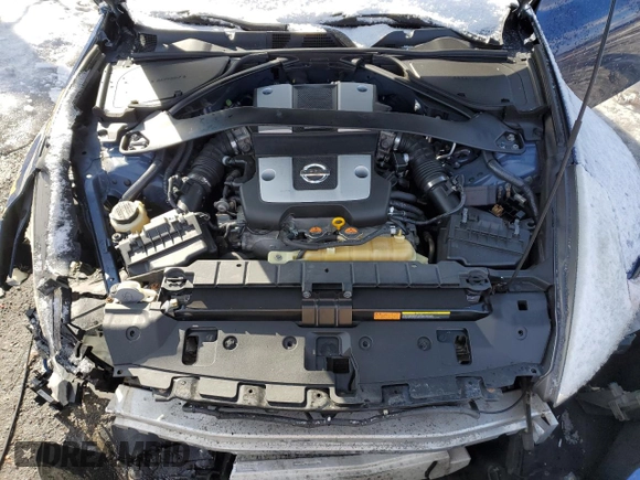 2013 Nissan 370Z z VIN JN1AZ4EH4DM383023, wystawiony jako Copart lot #88204985 z przebiegiem 138 112 mil mil oraz Szkoda całkowita • Salvage title. Historia ofert i sprzedaży dostępna na DreamBid. Obrazek 13.