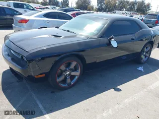 2013 Dodge Challenger SXT with VIN 2C3CDYAG9DH708717, listed as a IAAI auction lot 41990705 with 92,784 mi miles. Bid and sale history available at carsss.com. Image 19.
