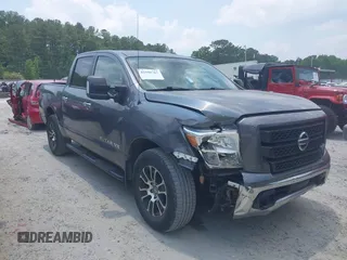 2020 Nissan Titan SL with VIN 1N6AA1EDXLN504157, listed as a IAAI auction lot 42398767 with 105,486 mi miles and . Bid and sale history available at DreamBid. Image 1.