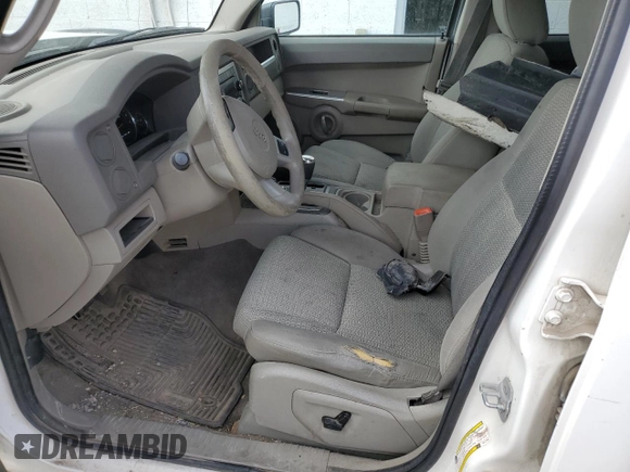 2008 Jeep Commander Sport with VIN 1J8HG48K68C111330, listed as a Copart auction lot 54011375 with 207,641 mi miles and Salvage title. Bid and sale history available at DreamBid. Image 7.
