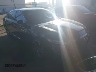 2018 Honda Accord Sedan Sport 1.5T with VIN 1HGCV1F3XJA242815, listed as a IAAI auction lot 41411348 with 62,654 mi miles. Bid and sale history available at carsss.com. Image 1.