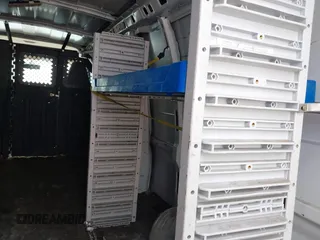 2017 Chevrolet Express Cargo Van with VIN 1GCWGBFFXH1139037, listed as a IAAI auction lot 41784999 with 198,660 mi miles. Bid and sale history available at carsss.com. Image 19.