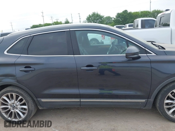 2015 Lincoln MKC with VIN 5LMCJ1A94FUJ13716, listed as a IAAI auction lot 41911220 with 194,825 mi miles. Bid and sale history available at carsss.com. Image 13.