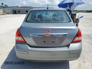 2009 Nissan Versa S with VIN 3N1BC11EX9L444814, listed as a Copart auction lot 59732395 with 188,471 mi miles and Salvage title. Bid and sale history available at DreamBid. Image 6.