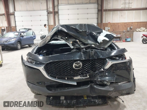 2025 Mazda CX-30 S Select Sport with VIN 3MVDMBBM2SM755621, listed as a IAAI auction lot 41945799 with 2,401 mi miles and . Bid and sale history available at DreamBid. Image 6.