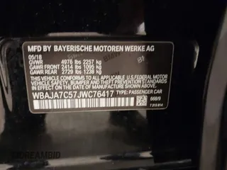 2018 BMW 5 Series 530i xDrive with VIN WBAJA7C57JWC76417, listed as a IAAI auction lot 42318400 with 64,367 mi miles and . Bid and sale history available at DreamBid. Image 9.